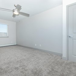 Carpeted bedoom at North 49 Apartments, located in Colorado Springs, CO