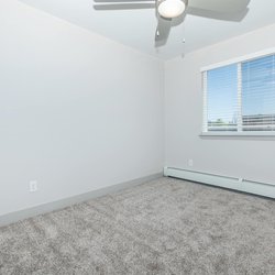 Carpeted second  bedoom at North 49 Apartments, located in Colorado Springs, CO