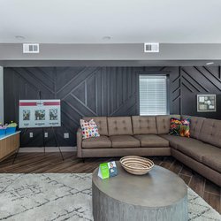 Clubhouse with TV and lounge area at North 49 Apartments, located in Colorado Springs, CO